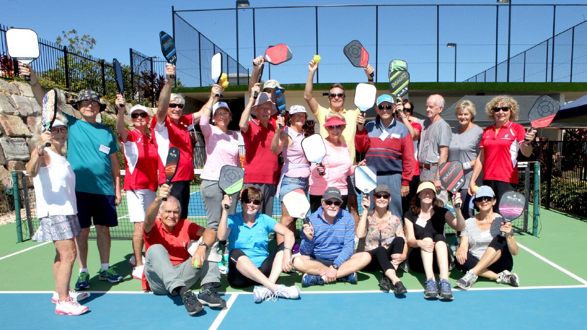 ON COURT: Participants learn to play pickleball at Halycon's villages during Queensland Seniors Week. 