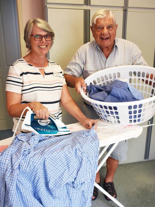 SHARING THE LOAD: Stan with support worker Wendy Lord. "I do handkerchiefs, Wendy does the shirts," says Stan.