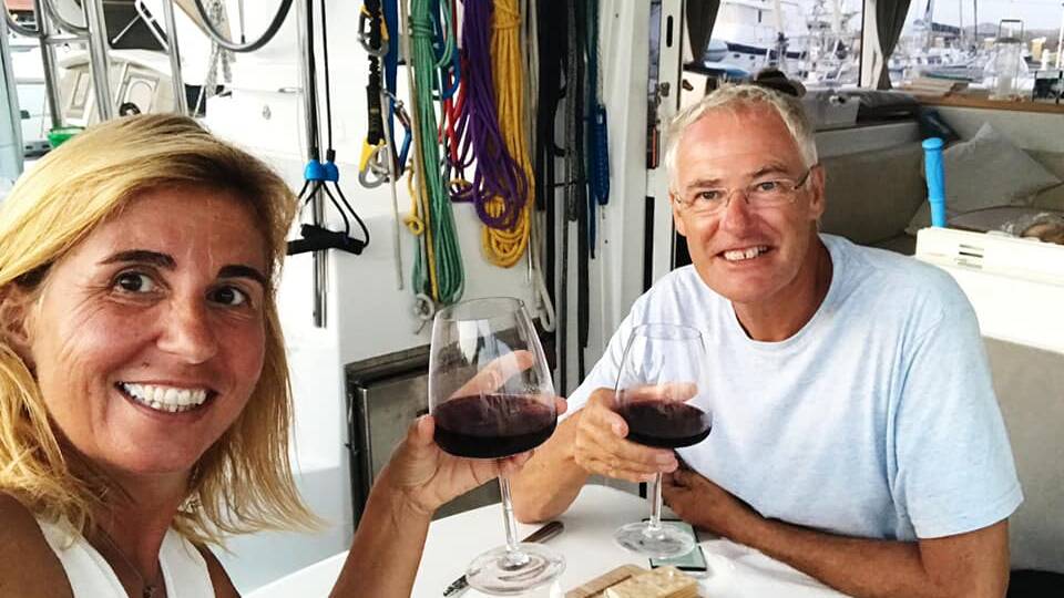 CHEERS: Simon, pictured here on board with Carla, says he has no regrets about their retirement choice. "We're as happy as we can be," he said.