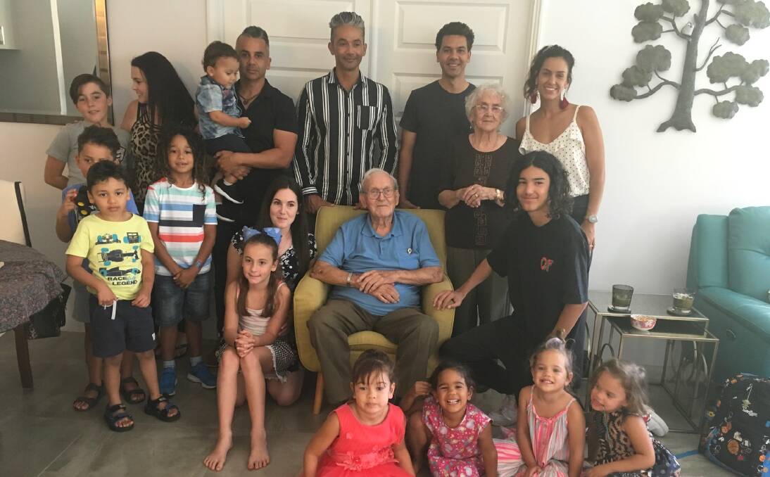 GENERATIONS: Dunkirk survivor Albert Johnson (seated) and his wife Mary (standing to the right) celebrated his 100th birthday surrounded by family at his Western Australia home.