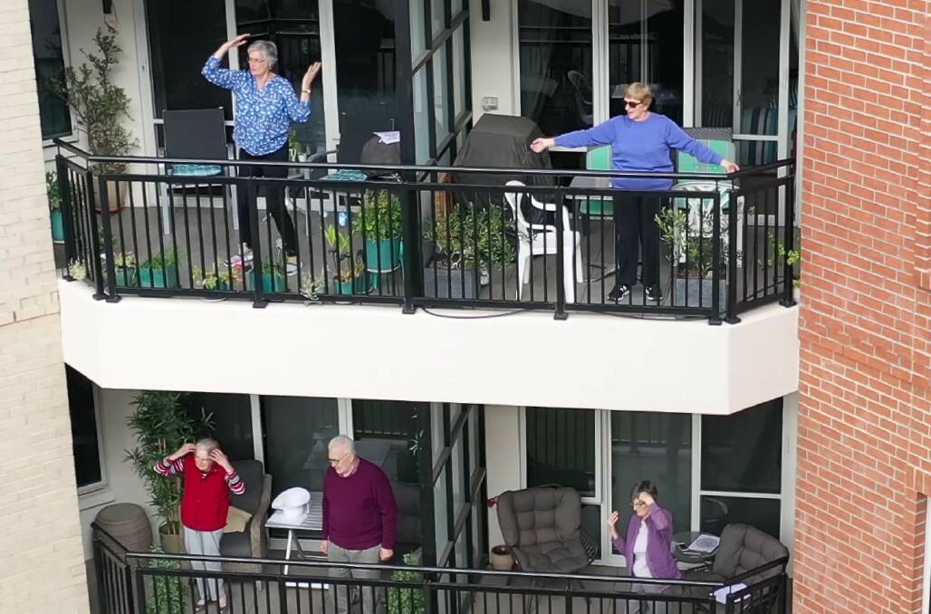 BALCONY MOVES: Residents at Nellie Melba Retirement Village are not letting COVID-19 quaratine restrictions get in the way of having a good time. 