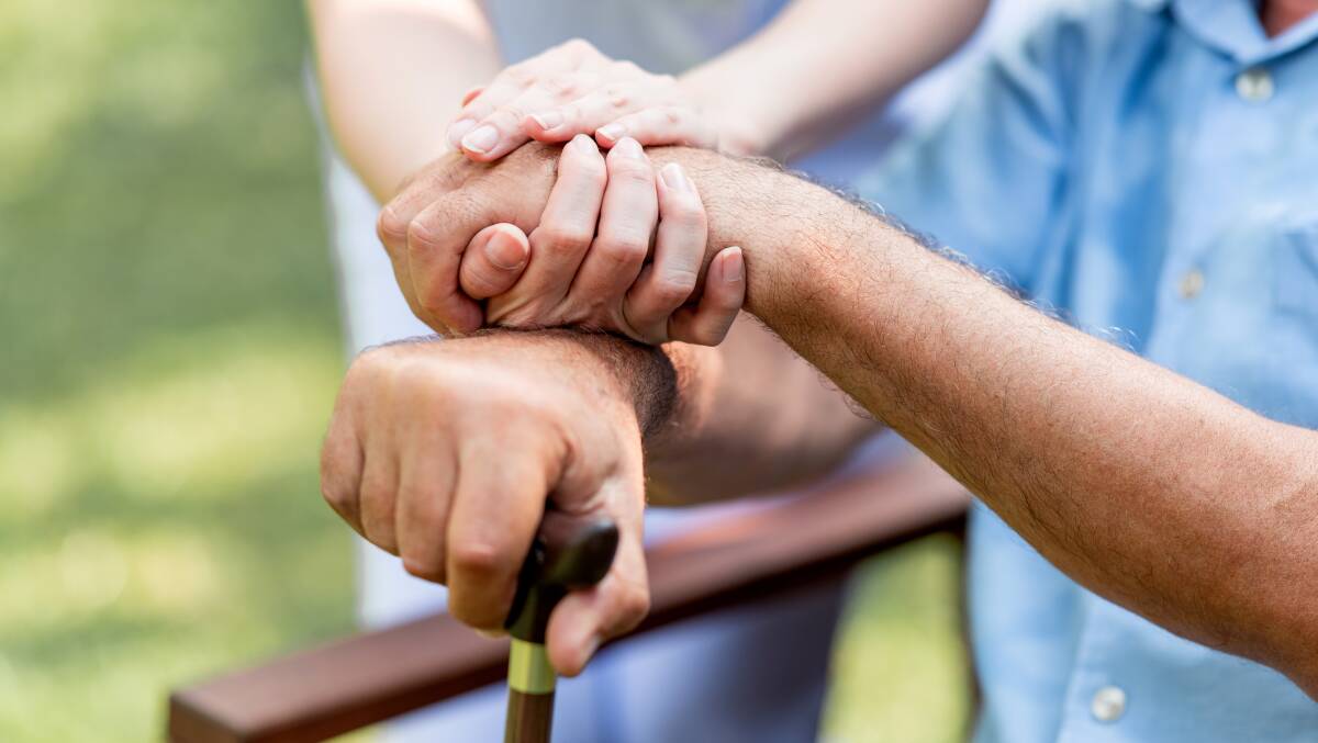 WELCOME VISIT: A visit from a Community Visitors Scheme volunteer can help reduce feelings of isolation for seniors living at home. Photo: Shutterstock