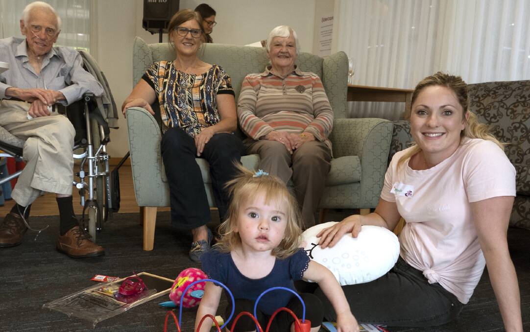 GENERATION GAME: Little Elders brings together four generations, residents John and Gretchen Bartsch with daughter Angela, granddaughter Amanda and great-granddaughter Ella.