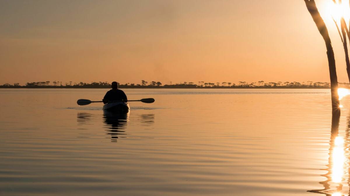 Kayaking at sunset on Lake Dumbleyung. Photo Christine Bairstow.