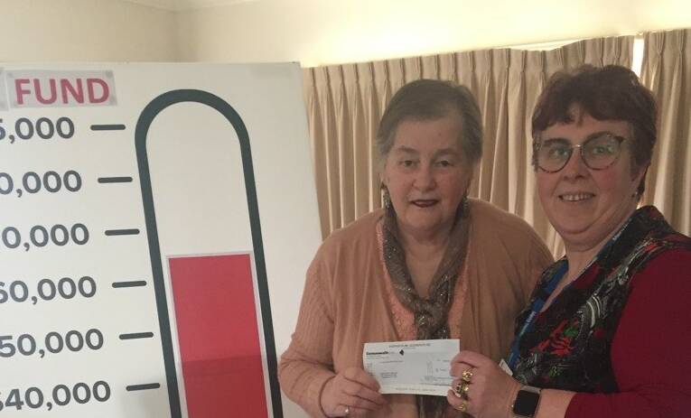 FUNDRAISING: Mercy Place Shepparton resident Laura Vagg (left) with service manager Angela Marchant. 