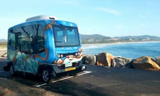 ALL ABOARD: Busbot, the brightly painted automated shuttle being trialled in Coffs. It is now gearing up to go totally driverless in Coffs Harbour Botanic Gardens. 