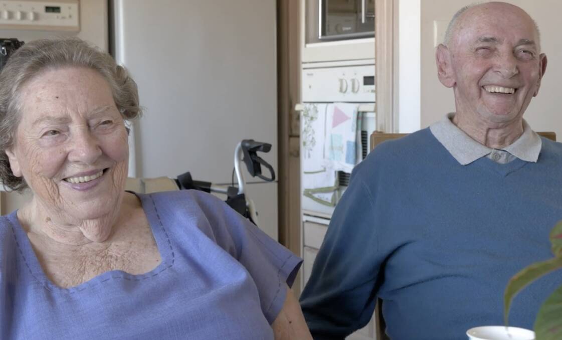 CONNECTED: Gold Coast couple Edith and Erich Neumann now use their tablet to stay in touch with friends and family and Google Home to help around the house.