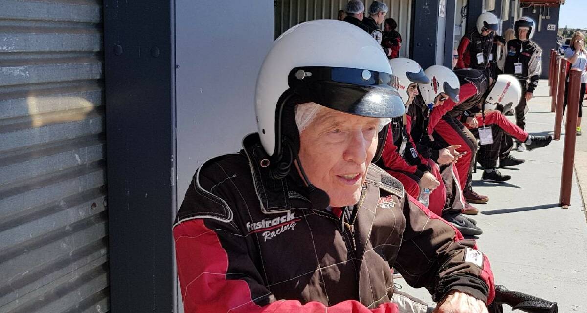 PUMPED: Ninety-one-year-old V8 fan Bruce Cahill gears up for his hot lap.