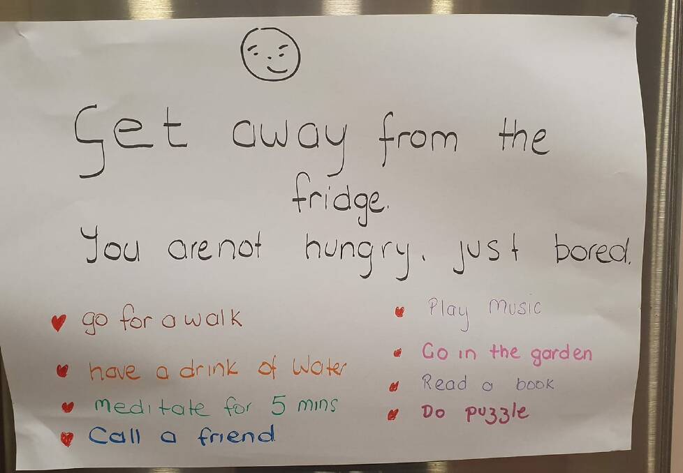 The Senior reader Carol Campbell, from the NSW Central Coast, has stuck a sign on her fridge in a bid to stay healthy during home isolation.