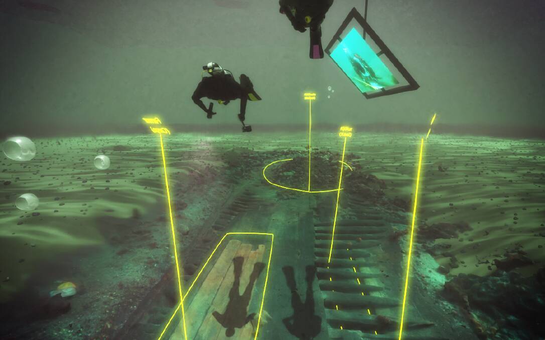 A scene from the virtual dive, showing the virtual diver and their dive buddy swimming over the wreck as it appears today, with areas of the wreck labelled in yellow. Photo: John McCarthy