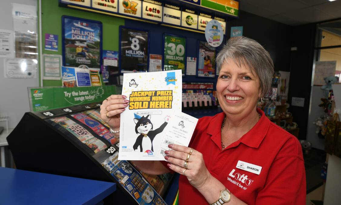 NUMBERS GAME: Trinity News & Gifts owner Sharon Bryon is beaming after the newsagency sold a $1.5 million Lucky Lotteries ticket. Photo: CHRIS SEABROOK 111620c2dollar1