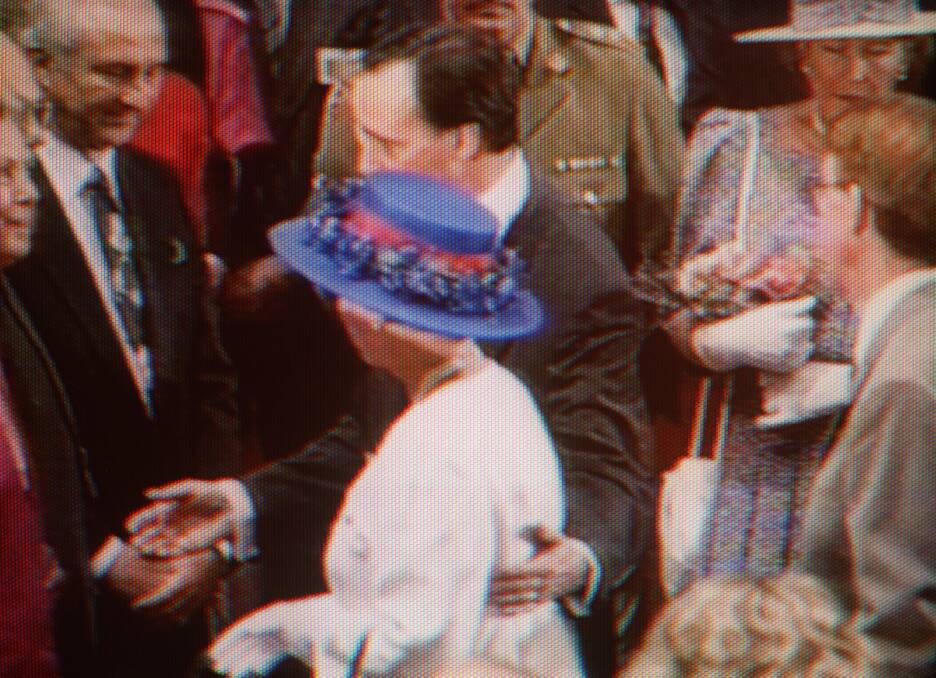 NO: Paul Keating guides HRH Queen Elizbaeth with a hand on her back which was considered a gesture showing too relaxed an attitude to the monarchy during her tour of Australia in 1992. Image from TV.

