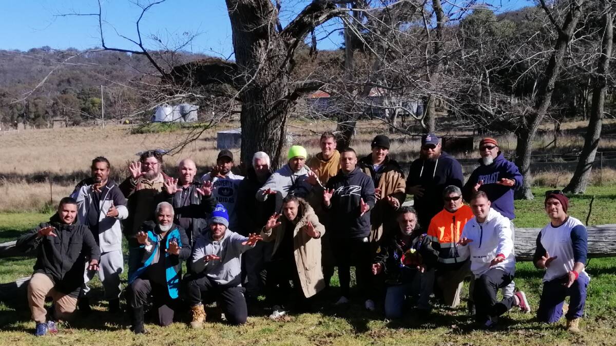 GLAD TO BE BACK: Participants in the Aboriginal men's initiation ceremony in Anaiwan/Nganyawana country on Mount Duval on June 5 and 6. Photo supplied.
