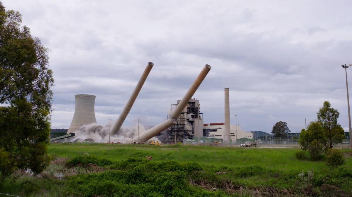 FALLING: The smoke stacks and boiler have been demolished at the Wallerawang Power Station near Lithgow. Picture: supplied