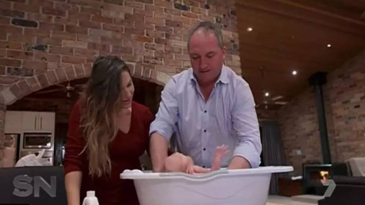 Joyce and partner Campion giving their son Sebastian a bath on Channel Seven's Sunday Night earlier this year. Photo: Seven
