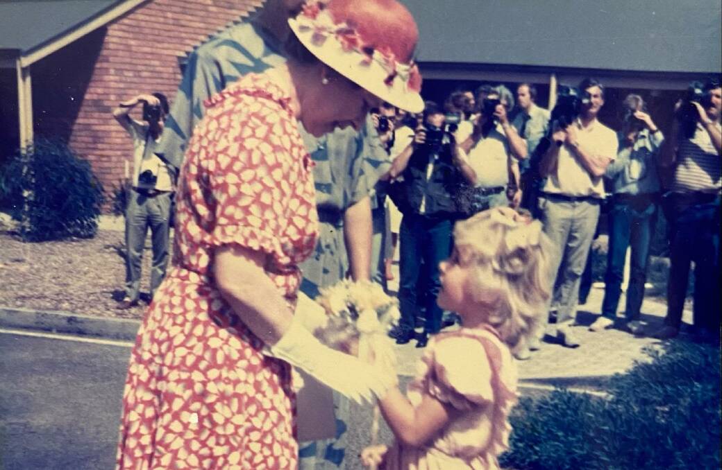 THANKS: Queen Elizabeth accepts a posy from five-year-old Kathryn Green during the royal visit to Whyalla that took place 36 years ago.