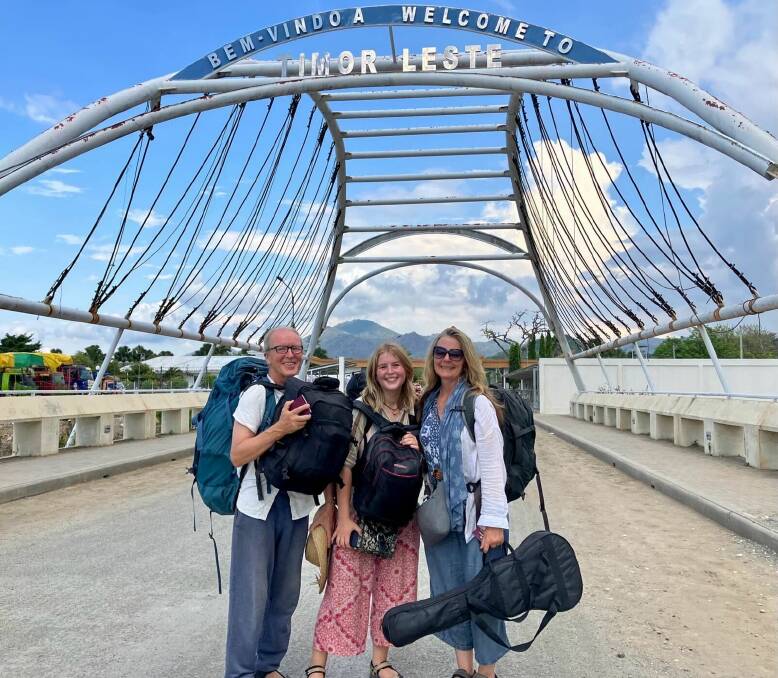 Theo Simon and wife Shannon Coggins and their daughter Rosa, at the border of Timor Leste before arriving in Australia. Picture supplied.
