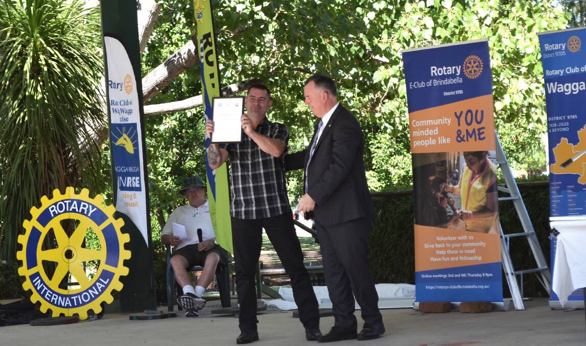 Wagga Mayor Dallas Tout presented a Peace Award to ADF veteran Damien Nye. Picture by Taylor Dodge