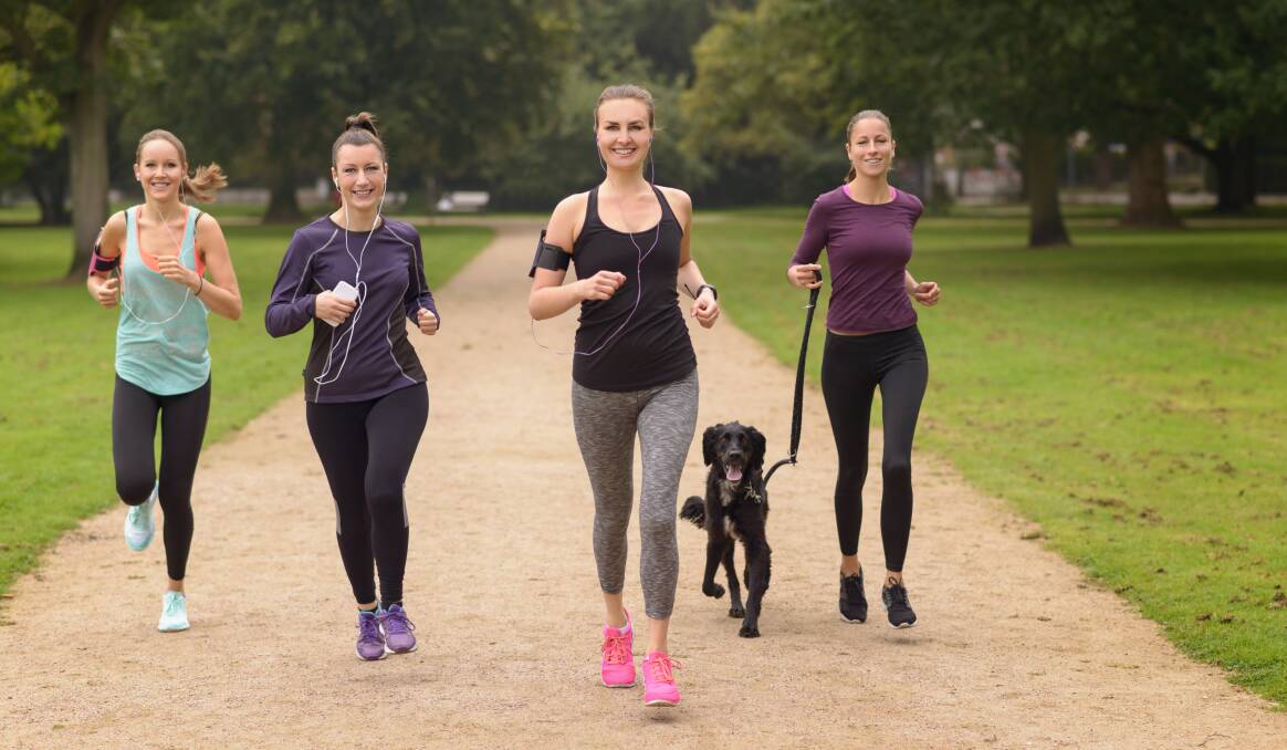 FUN AND FITNESS: Get a group of friends and the dog together for a catch-up while you walk or jog in the park.