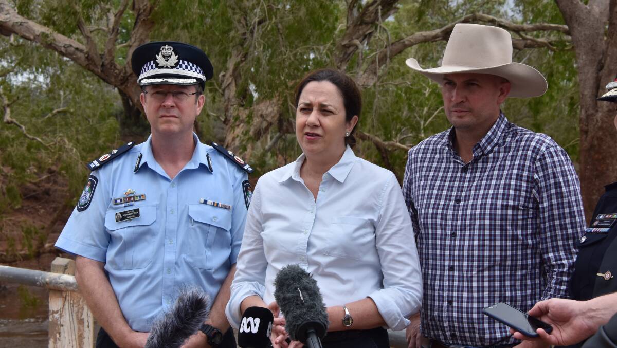DISASTER: Queensland Premier Annastacia Palaszczuk with Police Commissioner Bob Gee and Cloncurry mayor Greg Campbell after witnessing the catastrophic effects of floods in the region. Photo: Samantha Walton