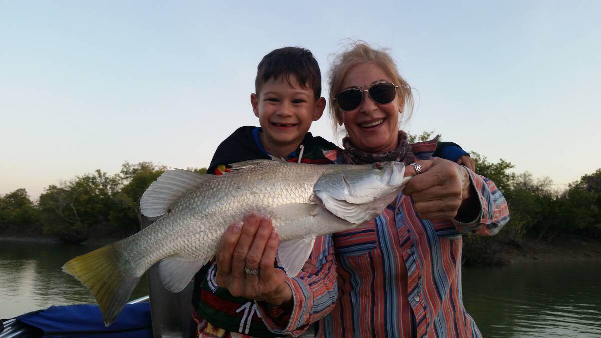 AYE KARUMBA: Karumba's Barra and Blues Festival will offer the opportunity to catch some huge barramundi following recent floods. Pictured: Veronica O'Brien and Grandson Marlin Tompkins. 
