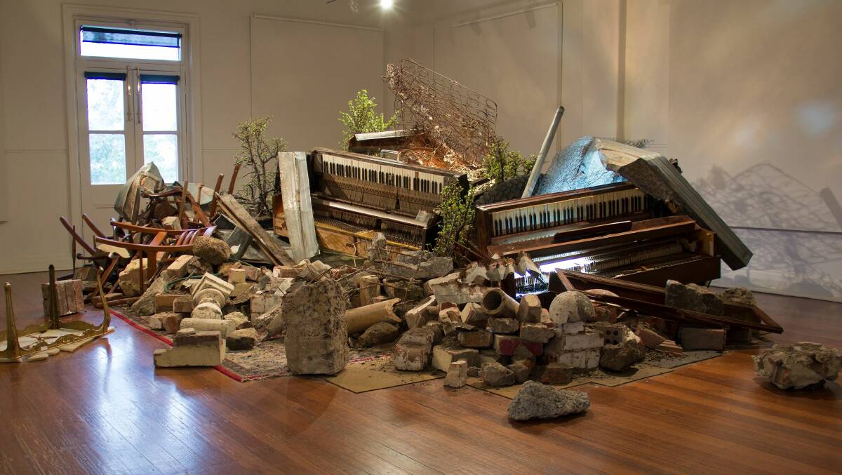 Dominic Kavanagh; Duet, 2016. Pianos, bricks and rubble, water, plants, various found objects and materials. Photo courtesy of the artist