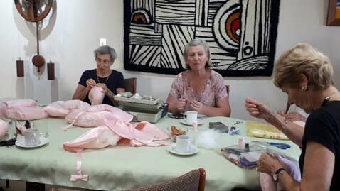 GIRL POWER: Members of Zonta's North Sydney branch making breast care cushions.