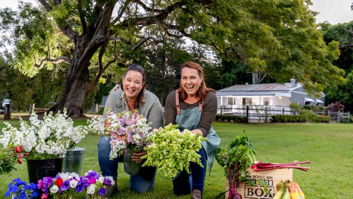 SHARING IS CARING Rach Watkins of Elderflower Farm and Chef Kate Raymont from the Scenic Rim Farm Shop & Cafe in Kalbar are keen to share local produce with visitors. 