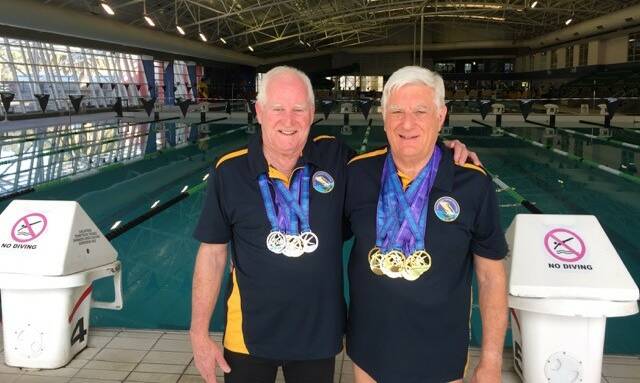 POOL PARTY: John Collis and Gary Stutsel had a lot of success at this year's Great Barrier Reef Masters.
