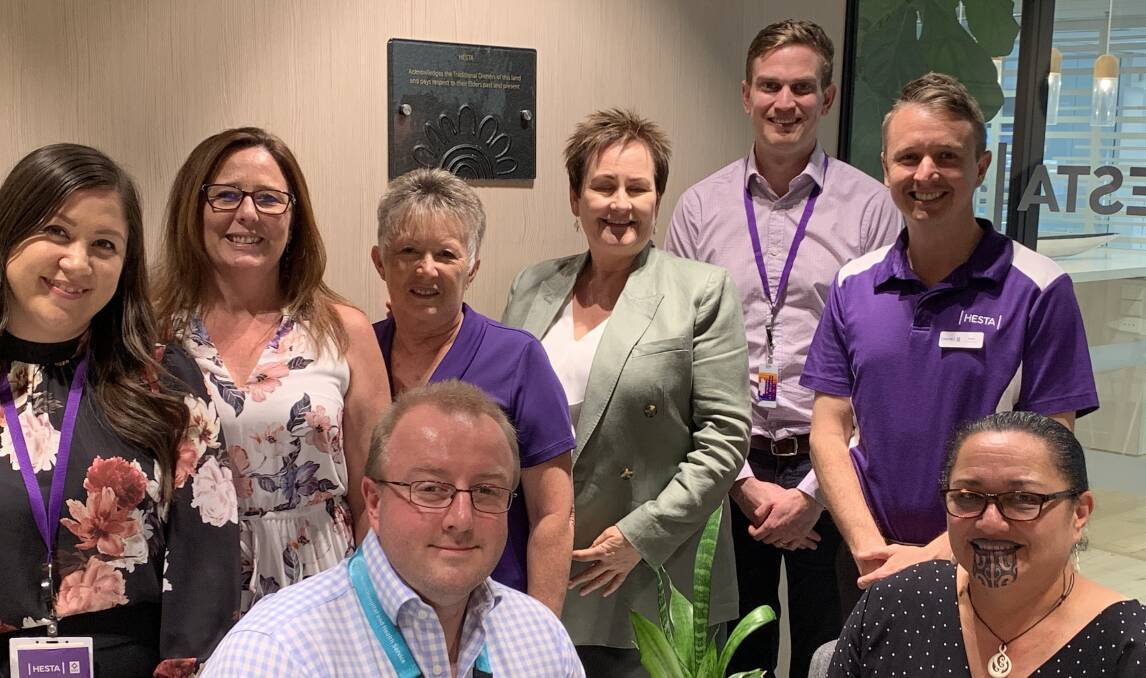 BRIGHT IDEA: Nurse researcher Dr James Hughes and Leonie Higgs (front) - pictured with colleagues from HESTA Queensland - are leading research into whether activity kits could reduce stress and trauma for patients with dementia.