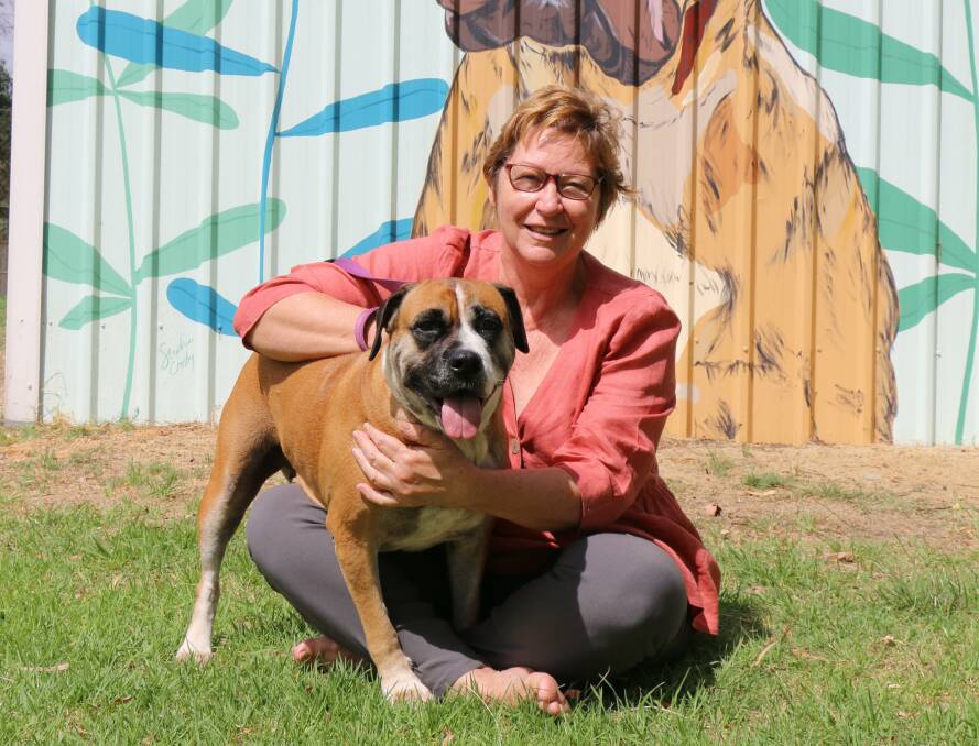 FURM FRIENDS: Senior pet lover Heather Cassie (65) with foster baby Bobbi. New resaerch suggests having a dog can reduce the risk of disability in seniors. Photo courtesy of RSPCA WA.