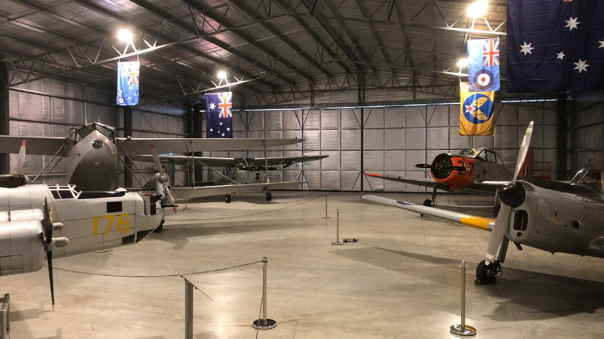 HIGH FLYERS: Tocumwal Aviation Museum's display hangar offers a chance to get up close and personal with planes like the B-24 Liberator (1/4 scale replica), 1944 de Havilland Rapide, 1952 Cessna O-1G Birddog, 1955 CAC CA-25 Winjeel and 1952 de Havilland DHC-1 Chipmunk (pictured l-r).