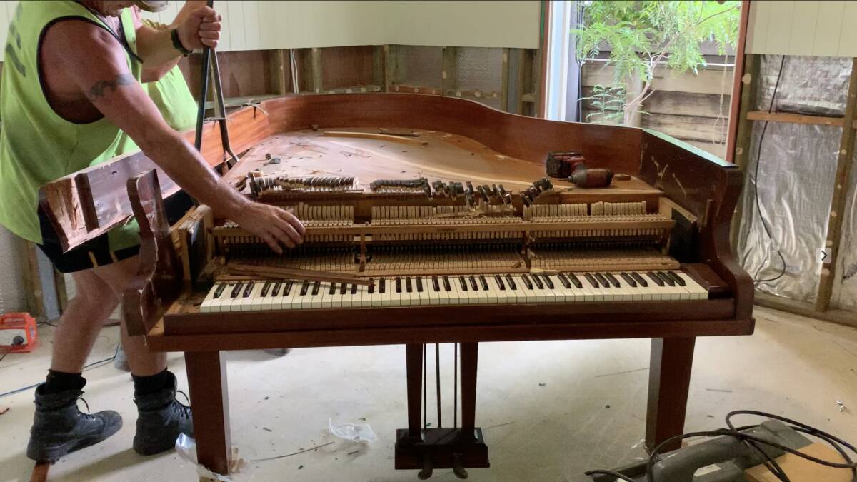 MAJOR LOSS: Eve lost her treasured 1958 Broadwood piano to flood damage late last year. Photo: Eve Klein.