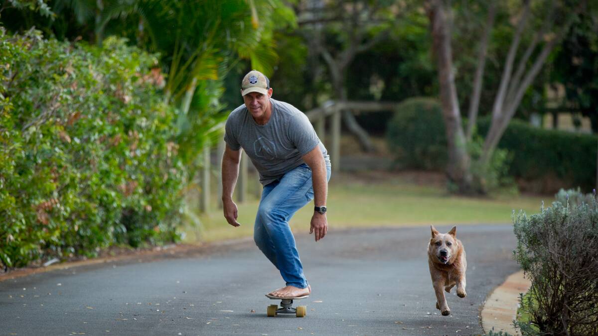 A NEW ROLL: Retired cricket great Matt Hayden (pictured with his dog Archie) is a big believer in the importance of staying fit and active. Matt is heading an awareness campaign during Men's Health Week.