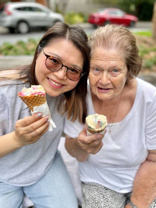 Ruby Cheung and Jill Butler enjoy an ice cream together. Picture supplied