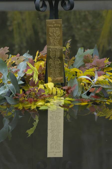  A list of the victim's names is mirrored in the reflective pool. Picture: The Examiner Archives
