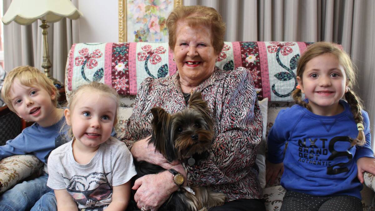 CAN WE PLAY AT YOUR PLACE?: Pauline Farrell and dog Nico receive a visit from Timothy Watkins, Harper-Grace Pozzi and Eva Fawcett