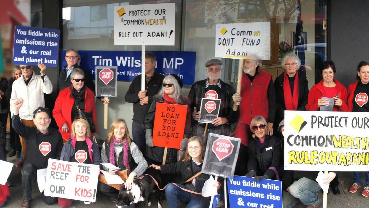 CALL TO ACTION: Bayside Climate Change Action Group members outside the office of local MHR Tim Wilson.