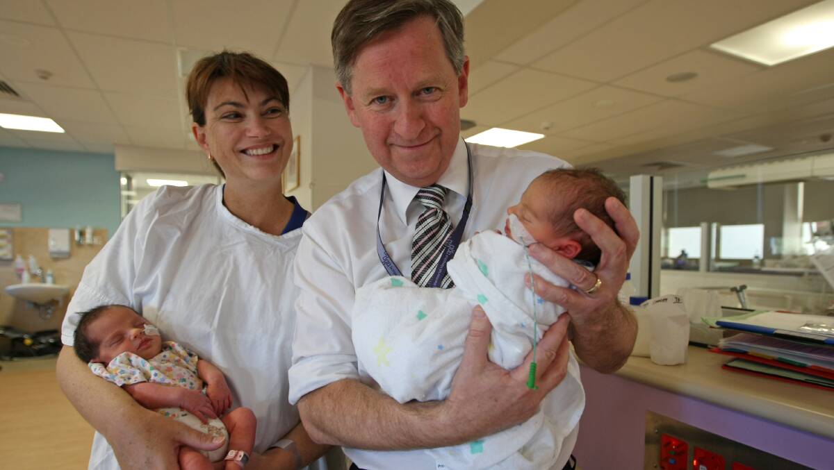 BUNDLES OF JOY: Professor Newham with newborns.