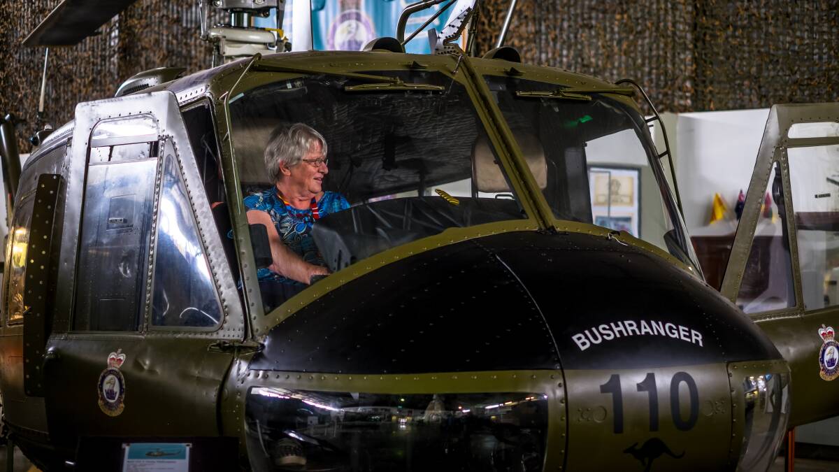 INCOMING: A visitor to the museum checks out an Iroquois helicopter. Converted ito gunships by the Australians, the choppers were known as Bushrangers and were used to avoid relying on the Americans for fire support.