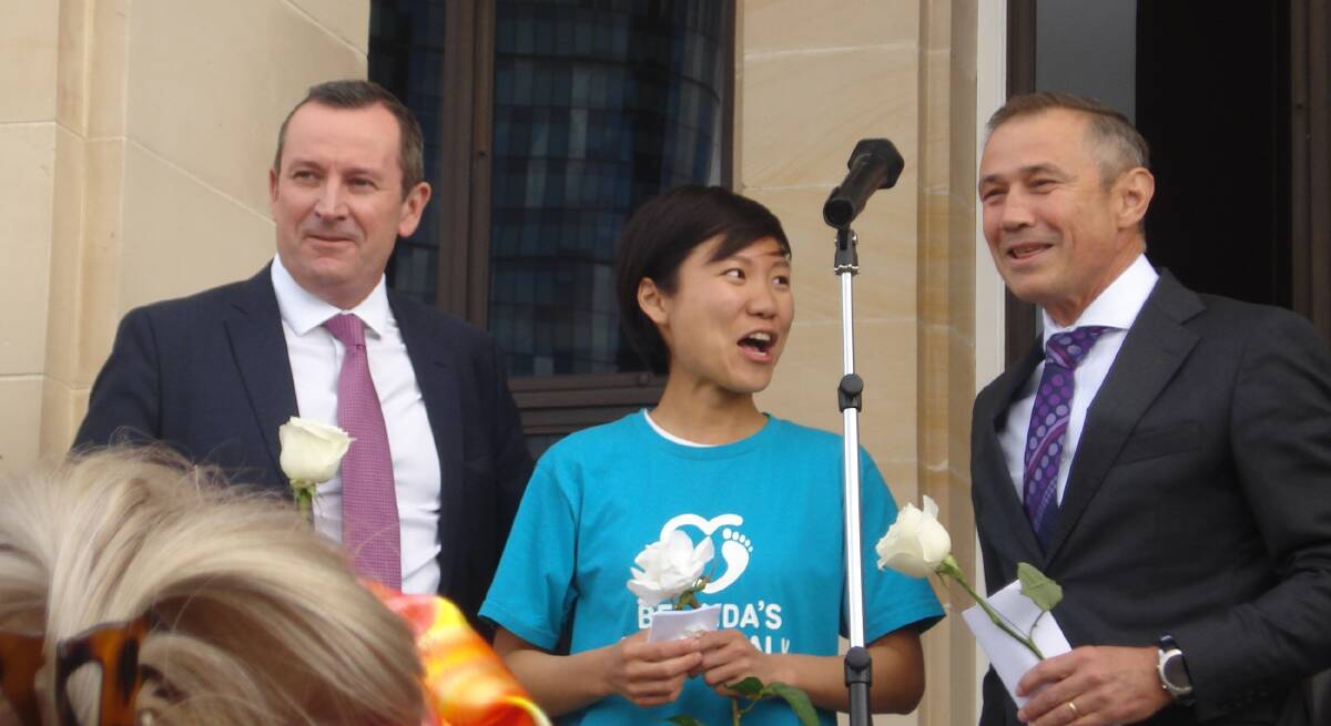 Emotional: Health Minister Roger Cook (right) with Premier Mark McGowan and Belinda Teh, a long-time campaigner for voluntary assisted dying.