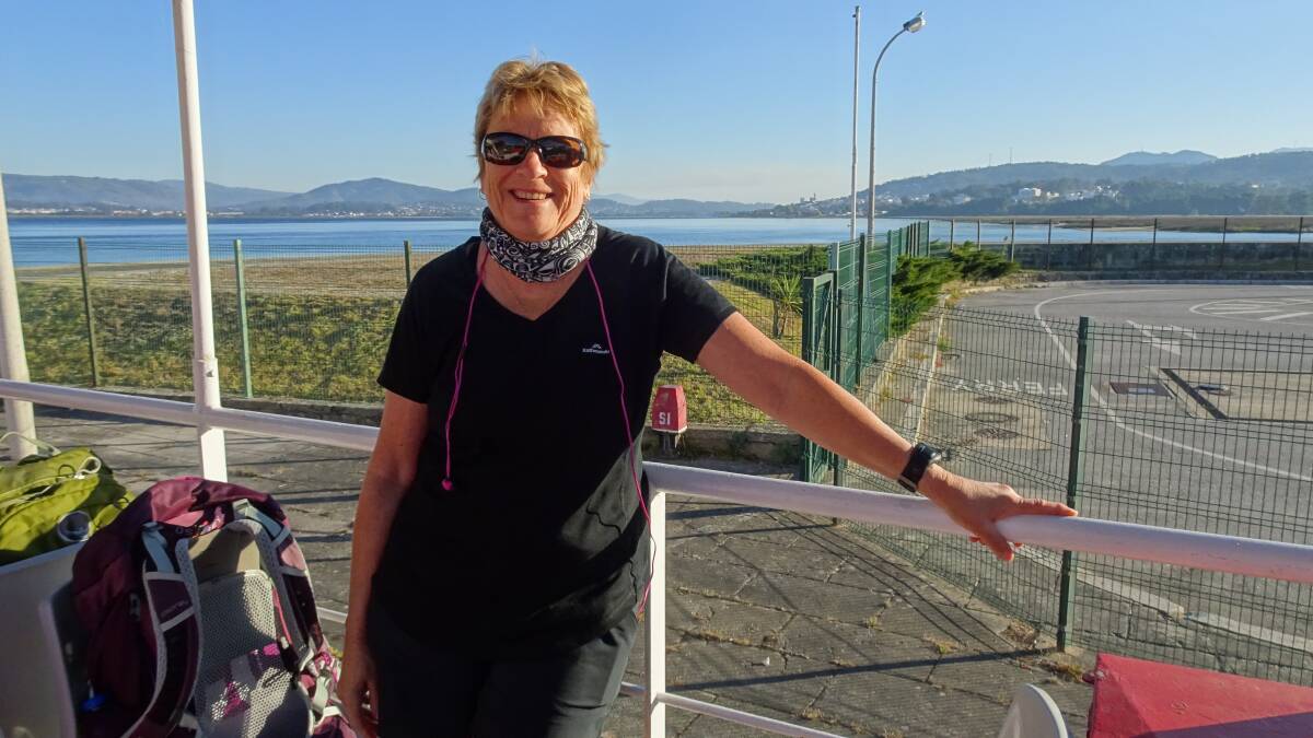 Jennifer Rooks pictured crossing into Spain on yet another fundraising walk for Cancer Queensland.