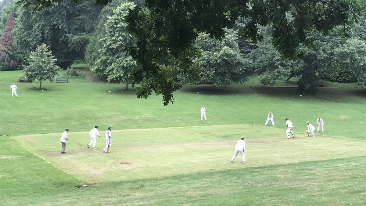 A day on the green: The competition was keen at the picturesque Cockington ground in Devon when Veteran's Cricket Victoria toured the UK last year.