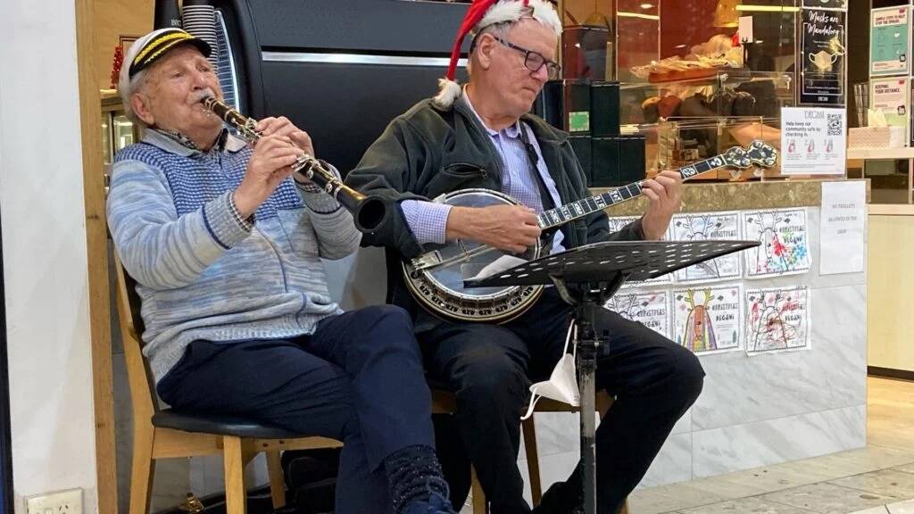 AND LOVING IT: Nick Polites and Tony Orr entertaining shoppers at Ivanhoe Mall in 2020.