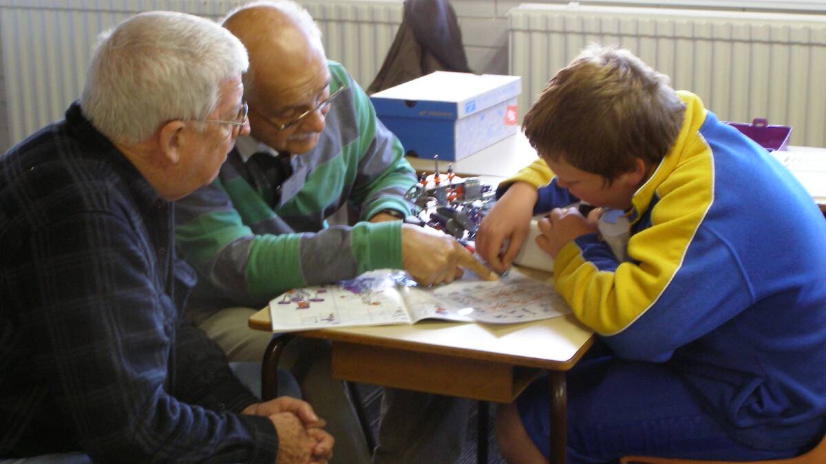 ENGAGING MINDS: A youngster learns new skills through Meccano
