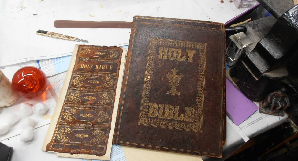 WORK IN PROGRESS: A family bible in the process of being restored by Sue.