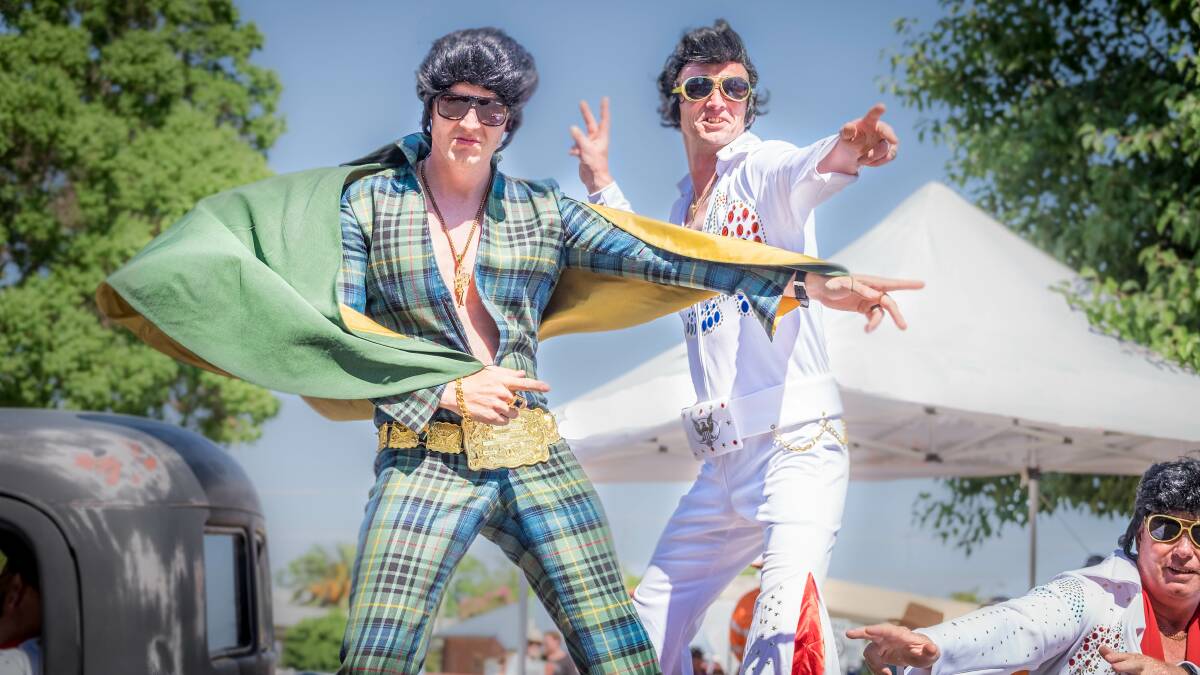 IS THERE ANYONE HERE WHO'S NOT ELVIS? The festival's annual street parade brings out all manner of pretenders to The King's throne.