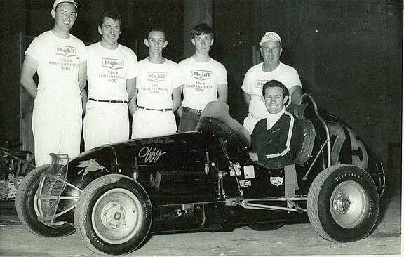 SPEED DEMON: Jeff Freeman in the pits at the Sydney Showground Speedway. A kind larrikin, he was loved by a legion of Sydney fans. Sadly, he was killed in the same car at Westmead Speedway on Mother's Day, 1965, a year or so after this photo was taken.