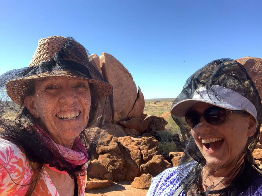 NO FLIES ON THEM: Travel companions Fiona Harper (left) and Carolyne Jasinski quickly found that fly nets were indispensable.