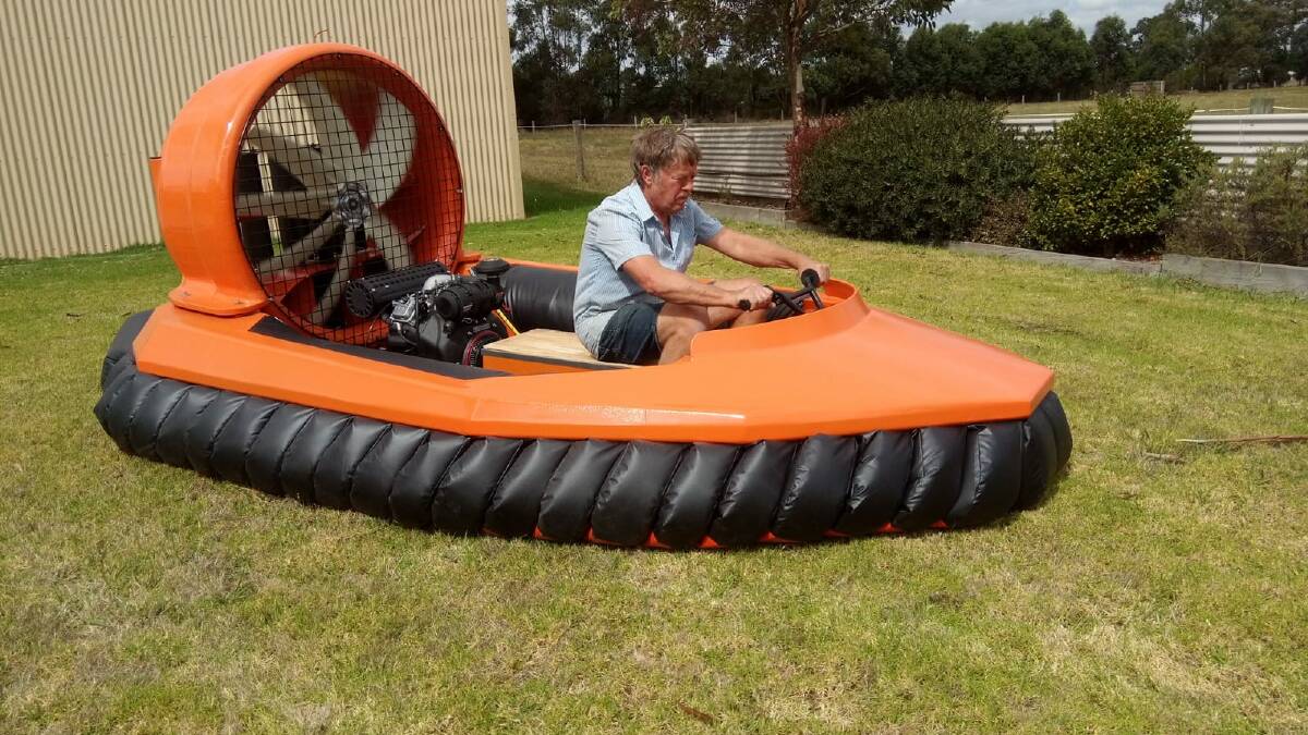 CHEAPER WAY TO FLY: A hovernaut pilots a typical hand-built sports hovercraft.